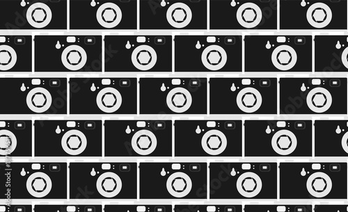 Pattern of black and white, hipster, beautiful, vintage retro cameras. Masonry from the cameras. Seamless texture. Vector illustration.
