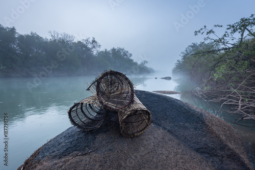 Cestos, armadilhas artesanais para pesca no rio Cubango em Angol photo