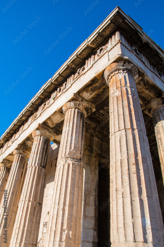 Close up of the columns of the Temple of Hephaestus or Hephaisteion. A Greek temple in the western perimeter of the Agora. It was dedicated to Hephaestus and Athena and it was built in 460-415 BC Close up of the columns of the Temple of Hephaestus or Hephaisteion. A Greek temple in the western perimeter of the Agora. It was dedicated to Hephaestus and Athena and it was built in 460-415 BC