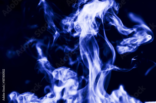 Abstract background, smoke on a blue background.