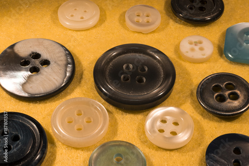 detail of several buttons for clothes
