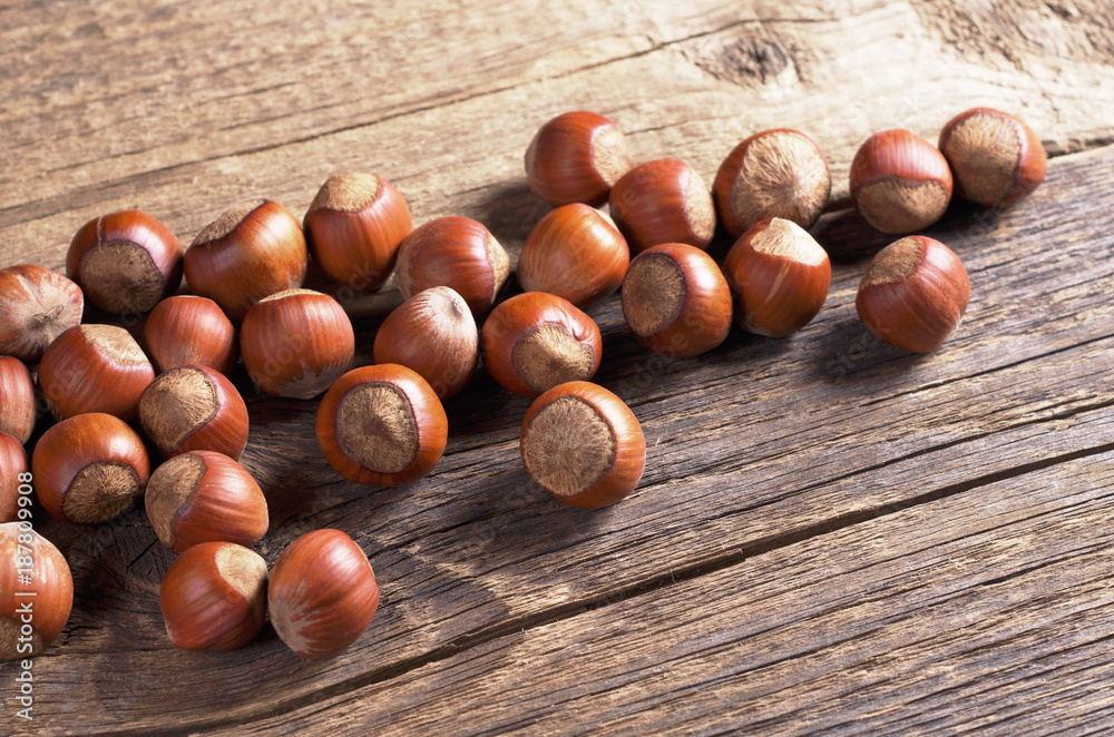 Hazelnuts on rustic table