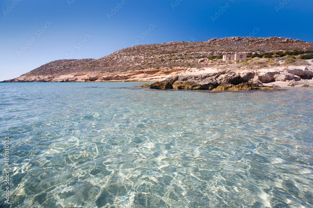 The crystalline water of the Mediterranean Sea,  remote beach of Creta island, Greece.