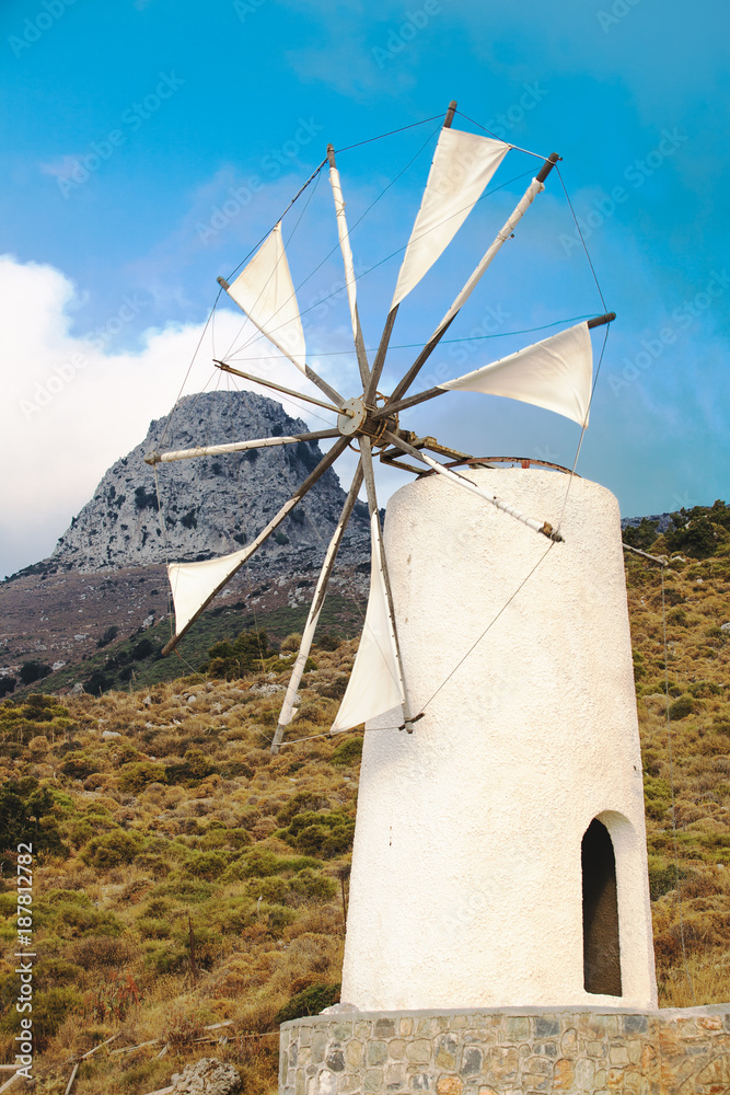 typical white windmills in Lassithi plateau,  just before the village of Kera, Crete island, Greece, Mediterrana
