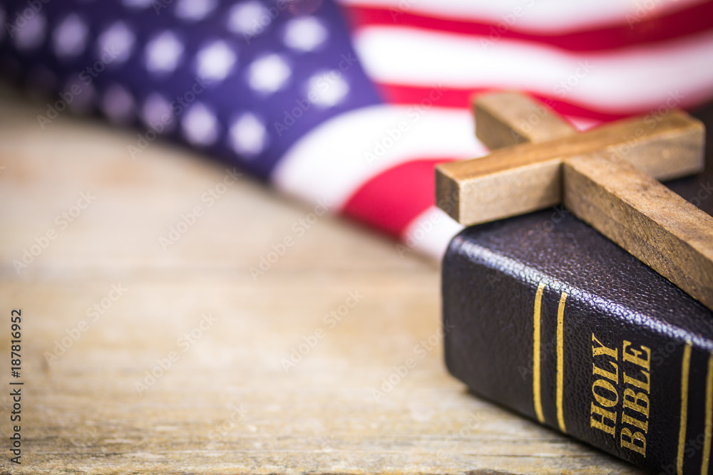 Naklejka premium Christian Cross and Bible American Concept