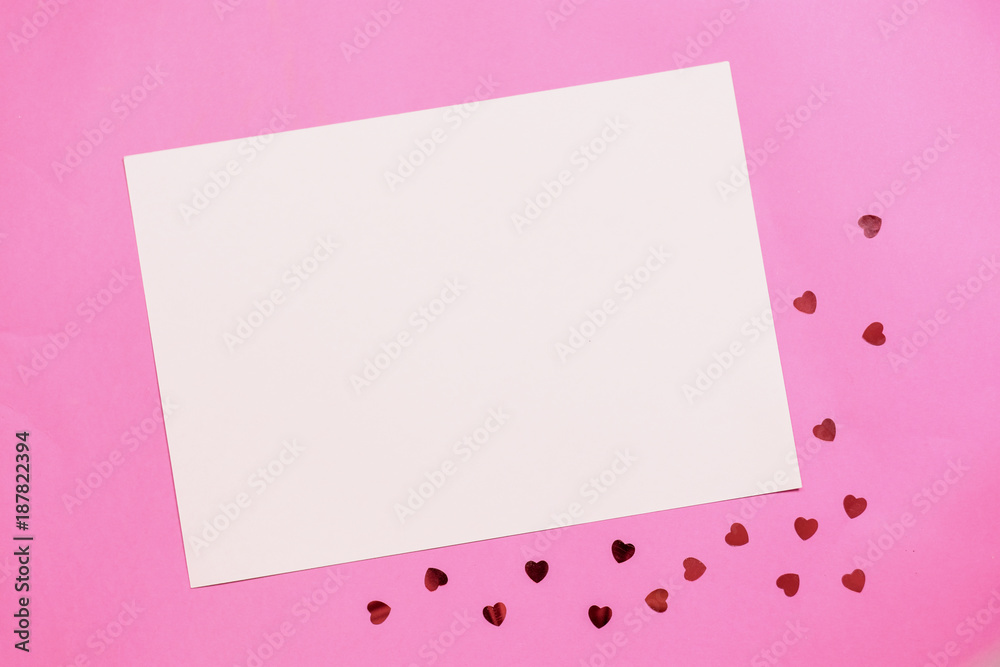 Paper pink background with empty notes. The concept of Valentine Day or bloggers. Flat Lay, top view Paper pink background with empty notes. The concept of Valentine Day or bloggers. Flat Lay, top view
