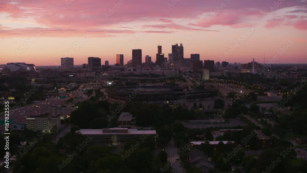 Atlanta, Georgia circa-2017, Flying over freeways leading to downtown Atlanta at sunset. Shot with Cineflex and RED Epic-W Helium. Atlanta, Georgia circa-2017, Flying over freeways leading to downtown Atlanta at sunset. Shot with Cineflex and RED Epic-W Helium.