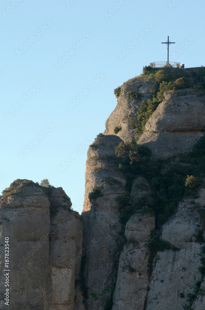 Fototapeta premium Blessed Valley of the Saint Miguel Cross, Abbey of Montserrat, Barcelona, Spain. Santa Maria de Montserrat is a Benedictine abbey located on the mountain of Montserrat, Catalonia, Spain. 