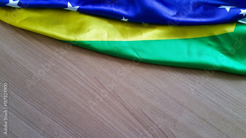 Brazilian flag on wooden background