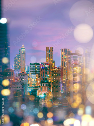 Abstract blurred and bokeh background of city skyline at night.
