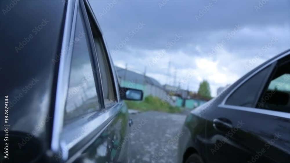 Opens window of car. Side car window opens. Mechanism of opening and