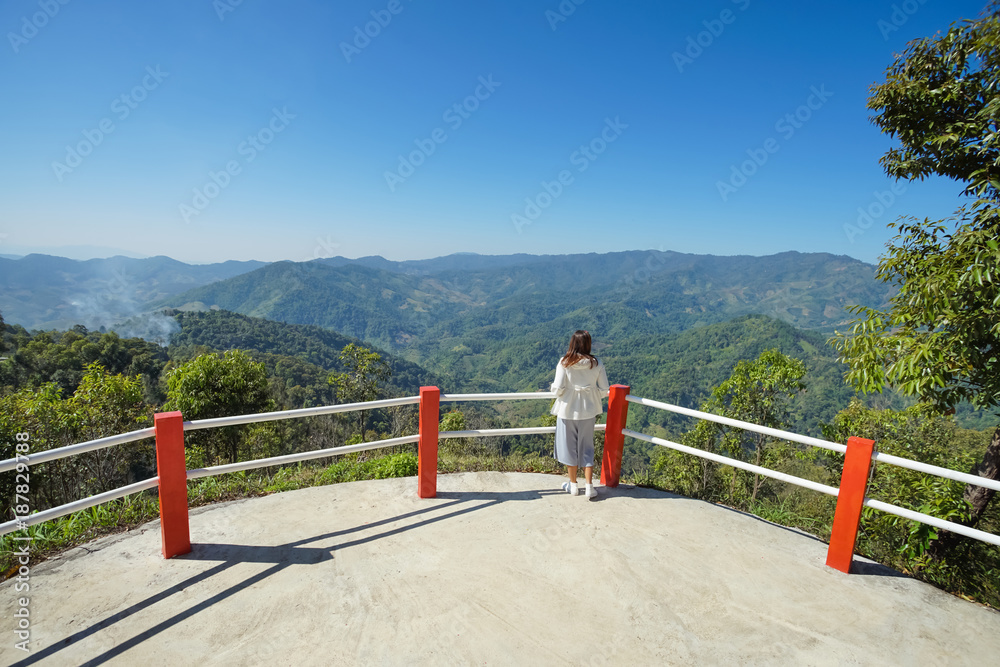 Woman tourist on view point in Doi Mae Salong, Chiang Rai Thailand Woman tourist on view point in Doi Mae Salong, Chiang Rai Thailand