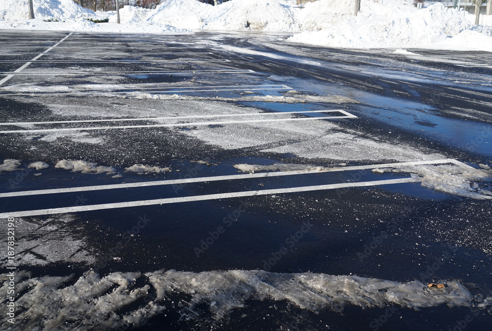 empty parking lot with snow removed empty parking lot with snow removed