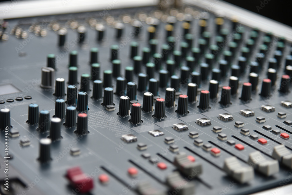 Sound technician audio mixer equalizer control.Sound Mastering For Radio and TV Broadcast. Sound technician audio mixer equalizer control.Sound Mastering For Radio and TV Broadcast.