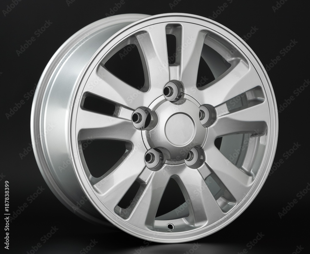 Obraz premium Aluminum metal wheel rim texture. Car alloy wheel, isolated on black background