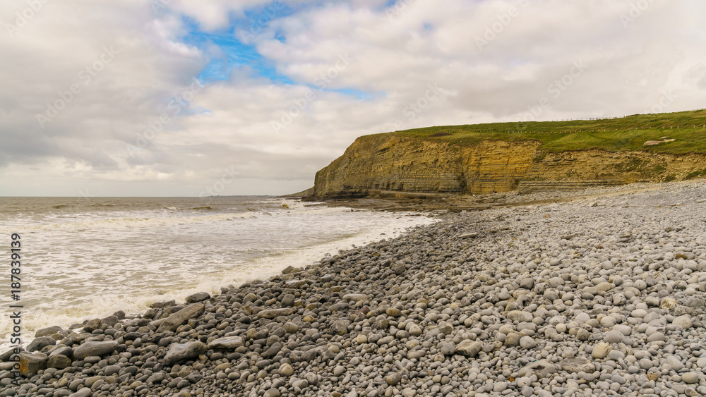 Stones and cliff in Dunraven Bay, Vale of Glamorgan, Wales, UK