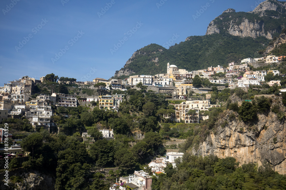 Panorama of Positano with houses climbing up the hill, Campania, Italy