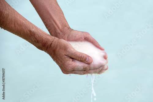 Dead sea salt in male hands