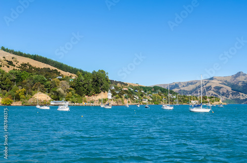 Akaroa which is located at the south island of New Zealand. 