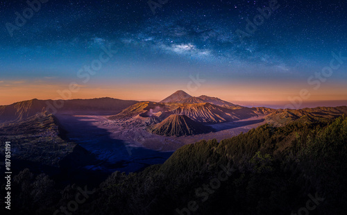 Mount Bromo volcano (Gunung Bromo) on night sky with milky way in Bromo Tengger Semeru National Park, East Java, Indonesia. photo