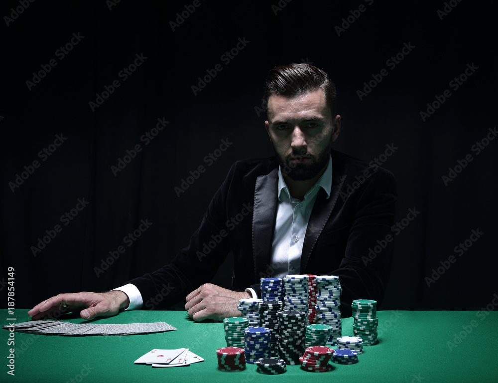 Player at the Poker table. Player at the Poker table.