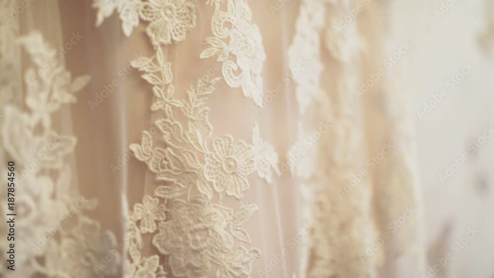 Closeup of white wedding dress Closeup of white wedding dress