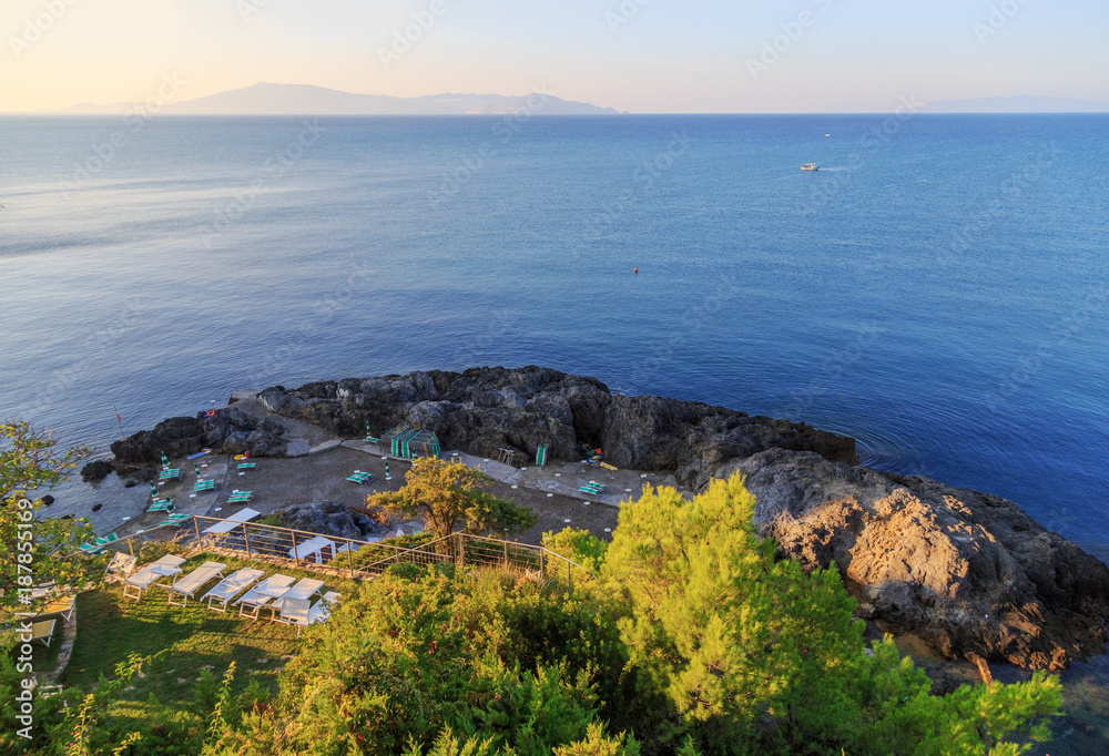 View of the beach, the Tyrrhenian Sea and Monte Argentario from the window of the hotel in Talamone, Italy