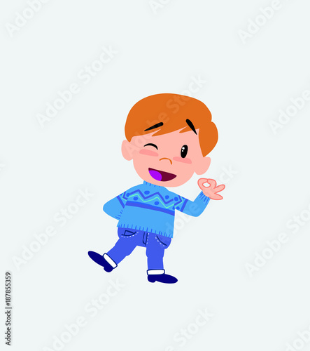 White boy in jeans doing the OK sign with his hand.