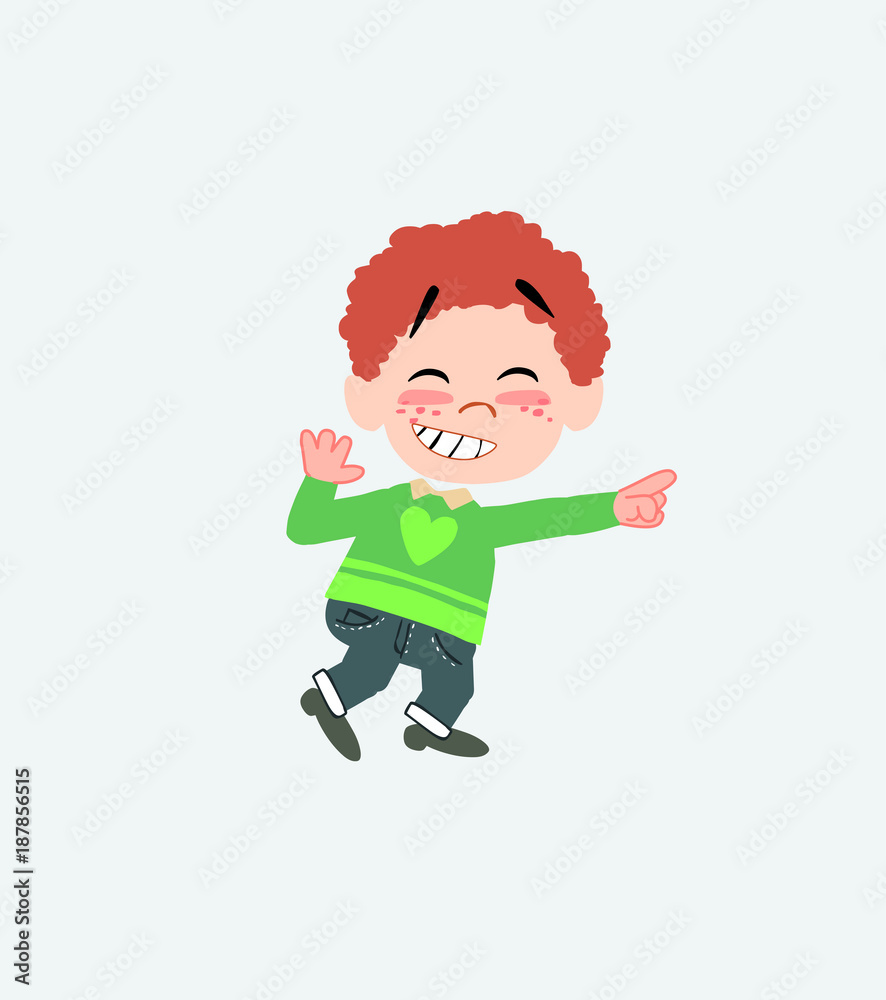 White boy in jeans pointing to something funny on his left. White boy in jeans pointing to something funny on his left.