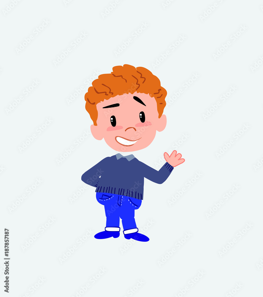White boy in jeans showing something in positive attitude. White boy in jeans showing something in positive attitude.