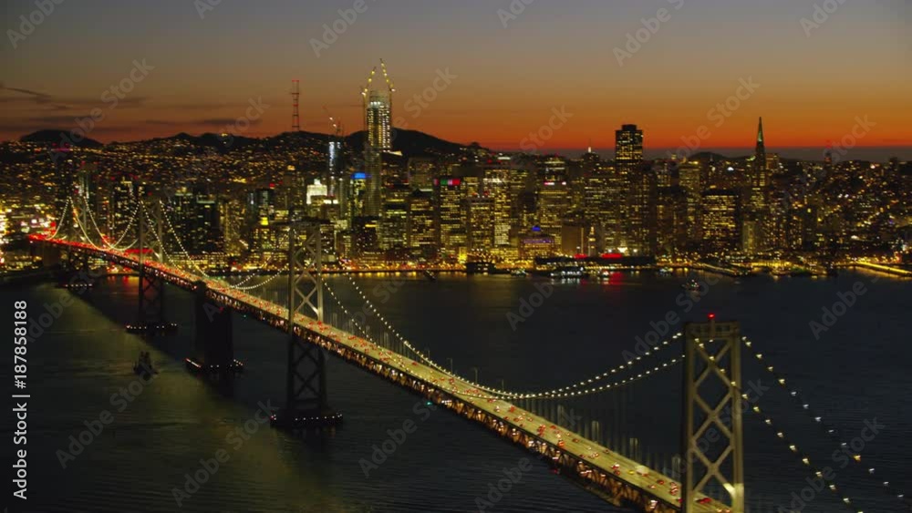 San Francisco, California circa-2017, Aerial view of Bay bridge and city at dusk San Francisco, California circa-2017, Aerial view of Bay bridge and city at dusk