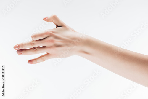 cropped shot of woman making dog gesture with hand isolated on white