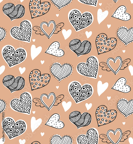 Seamless vector pattern with hand drawn doodle hearts.