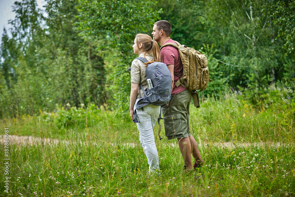 Fototapeta premium two travelers in the forest