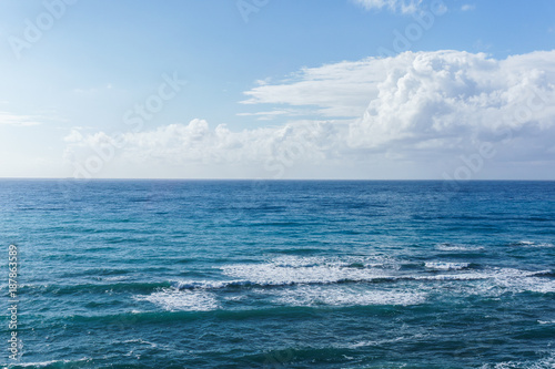 Image of blue sea and cloudy sky
