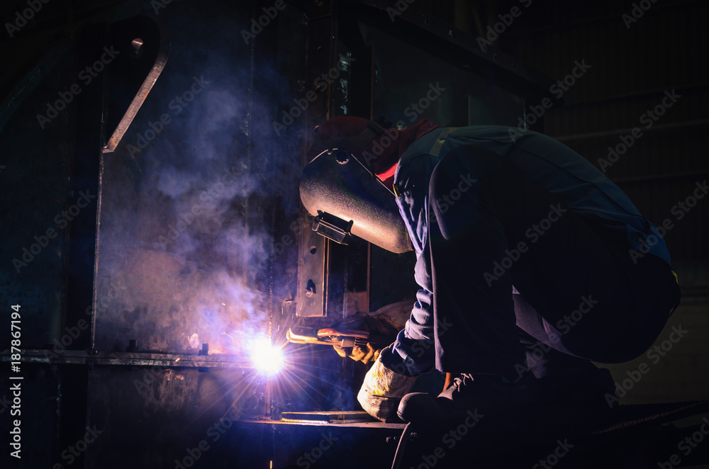 Welding steel structures and bright sparks in construction steel industry. Welding steel structures and bright sparks in construction steel industry.