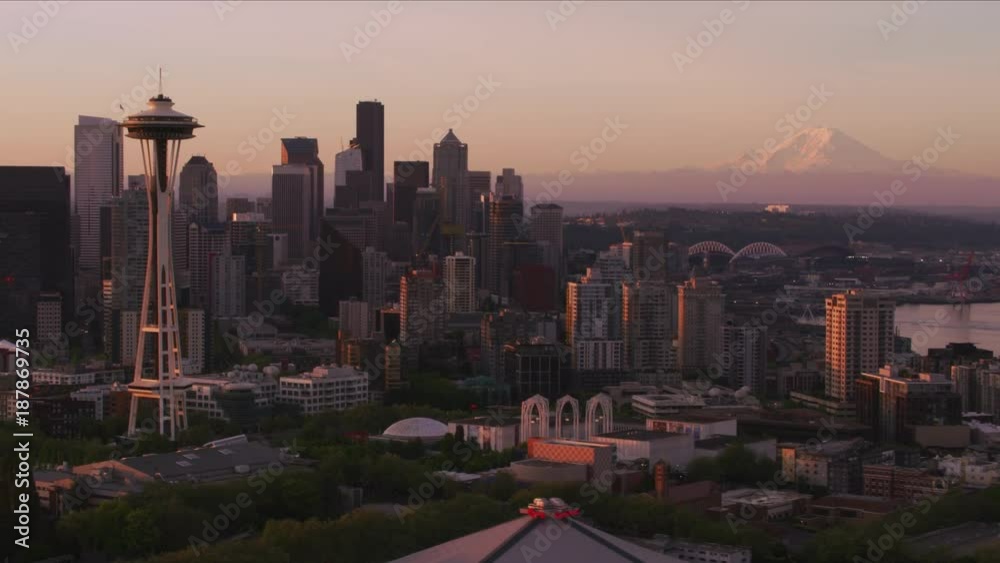 Seattle, Washington circa-2017, Aerial view of Seattle at sunrise with Space Needle and Mt. Rainier.  Shot with Cineflex and RED Epic-W Helium. 
