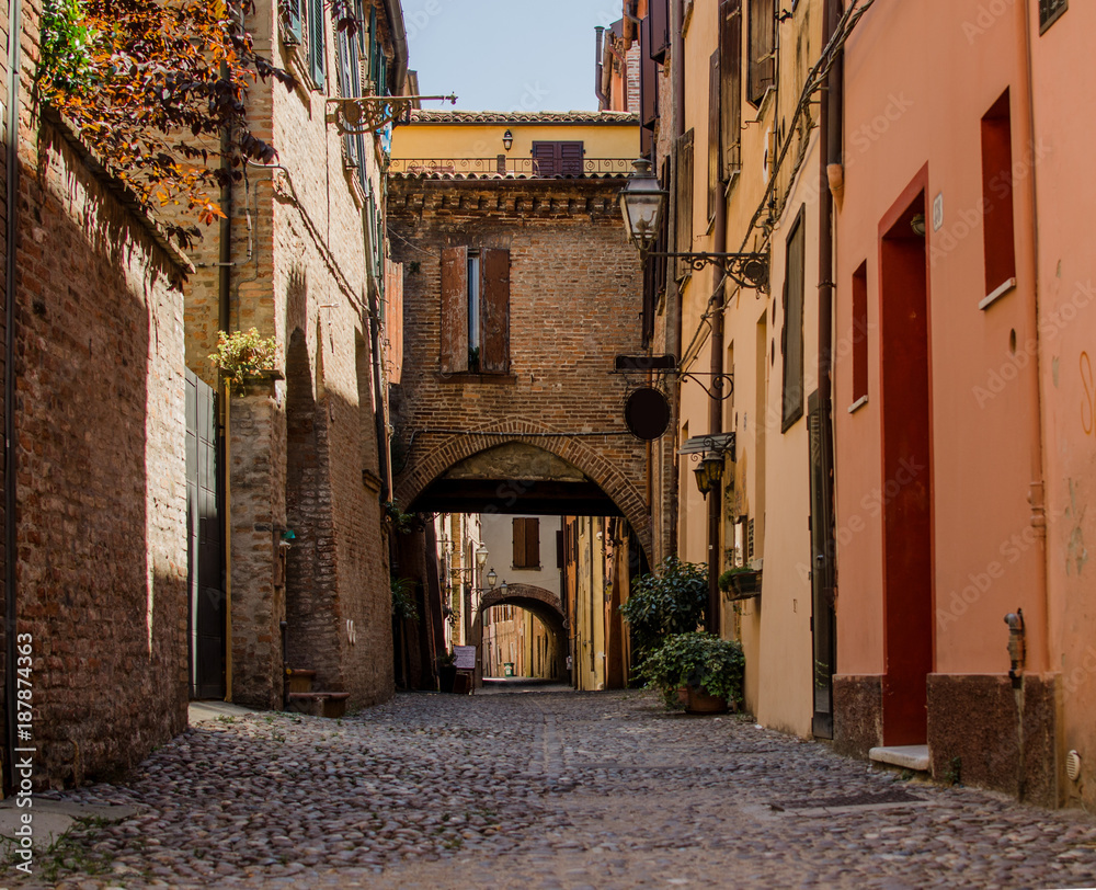 The picturesque  medieval street of Ferrara, Italy