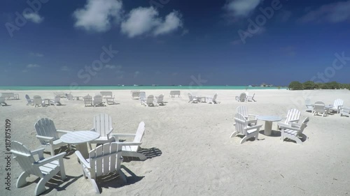 Dining Tables on the Beach at a Maldives Resort photo