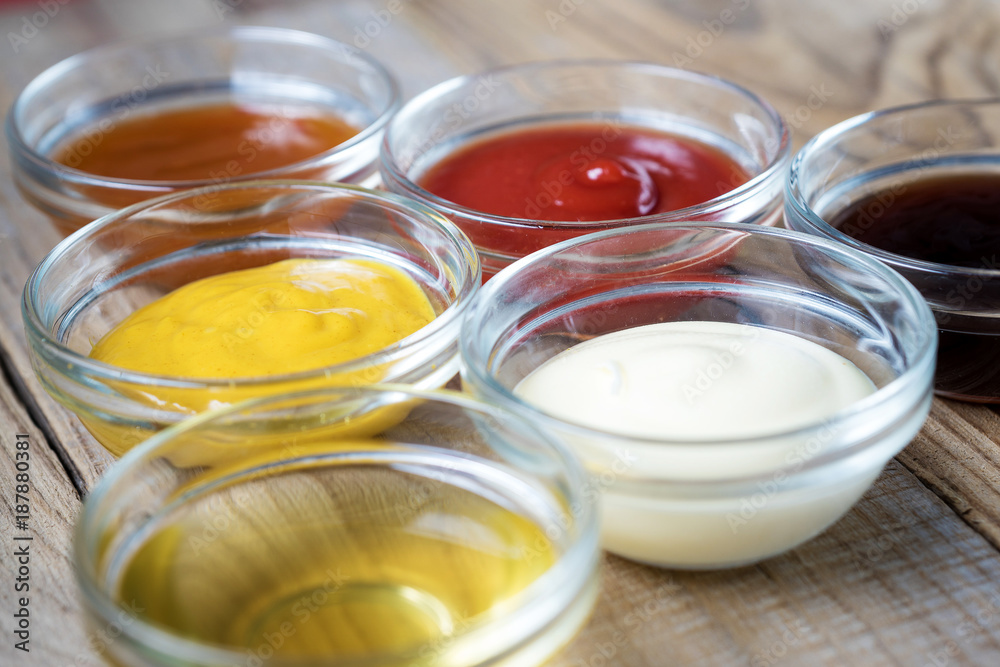 bowls of various dip sauces, top view bowls of various dip sauces, top view