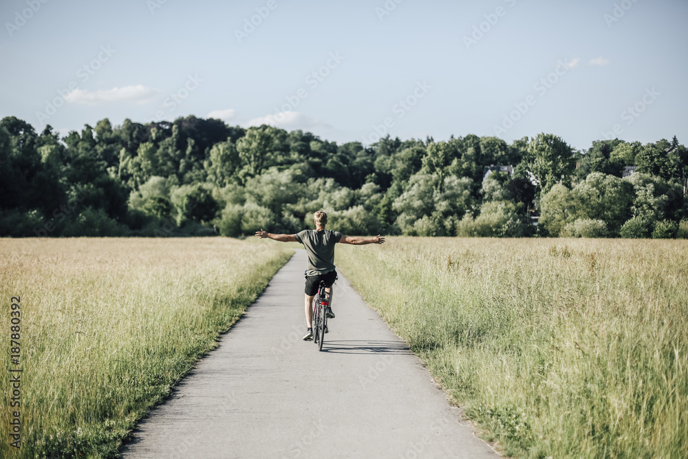 Young man riding a bike, freehand Young man riding a bike, freehand