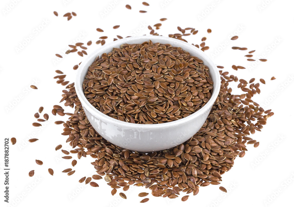 Flax seeds in wooden bowl isolated on white background close up Flax seeds in wooden bowl isolated on white background close up