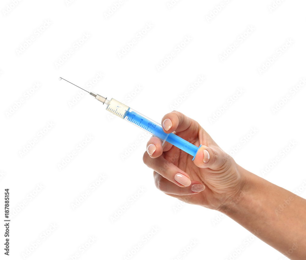 Doctor hand with medical syringe in hand ready for injection Doctor hand with medical syringe in hand ready for injection