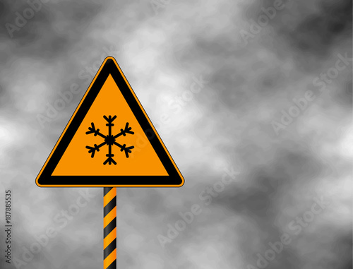 Winter warning yellow sign shows danger of ice and snow at street, highway or road. Snow warning sign (Risk of Ice warning sign) isolated on a grey sky. Vector illustration