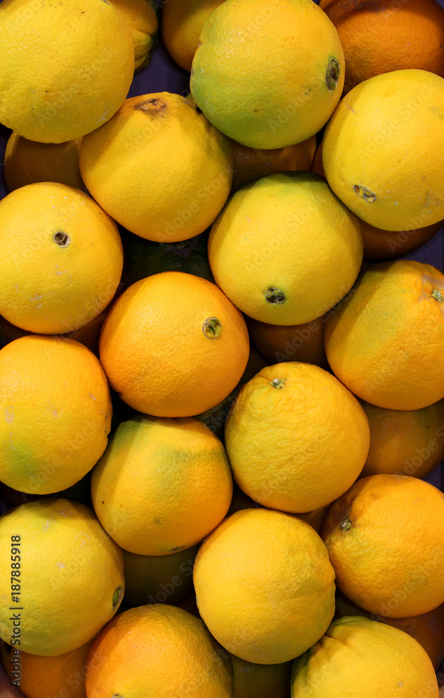 Background of ripe oranges
