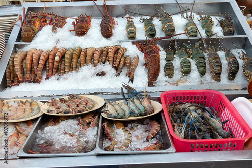 Different types of seafood lined on ice