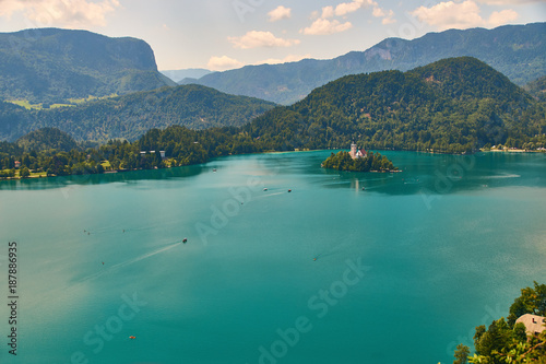 View of Bled lake with alps and picturesque island, view from the Bled Castle upper yard, Slovenia.