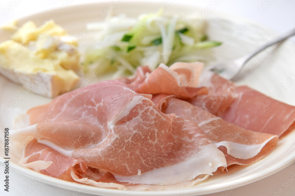 prosciutto ham in white background