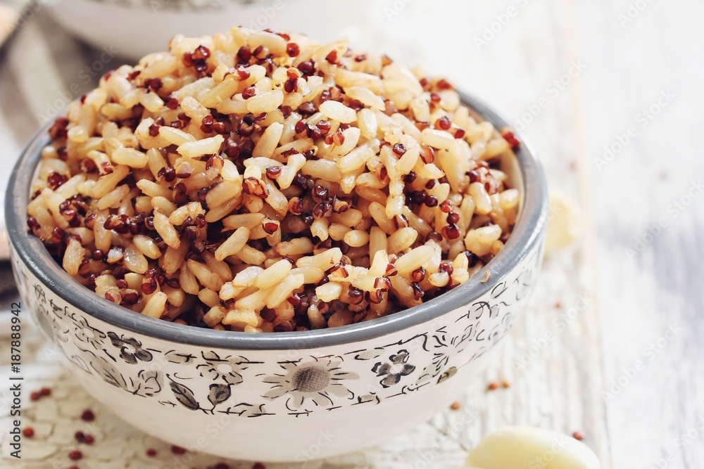 Cooked brown rice Quinoa bowl, selective focus Cooked brown rice Quinoa bowl, selective focus