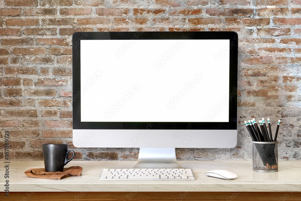 Fototapeta premium Mock up Workspace Desktop Computer : Creative designer desktop with blank white Desktop computer, pencils and stationery items. Blank screen for graphics display montage.